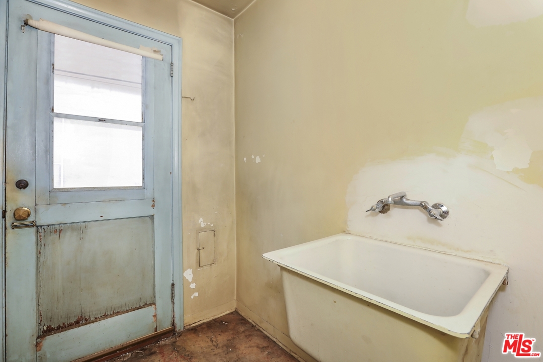4053 Verdugo Road Los Angeles, CA 90065 - Photo 25 of 45 a bathroom with a tub and shower