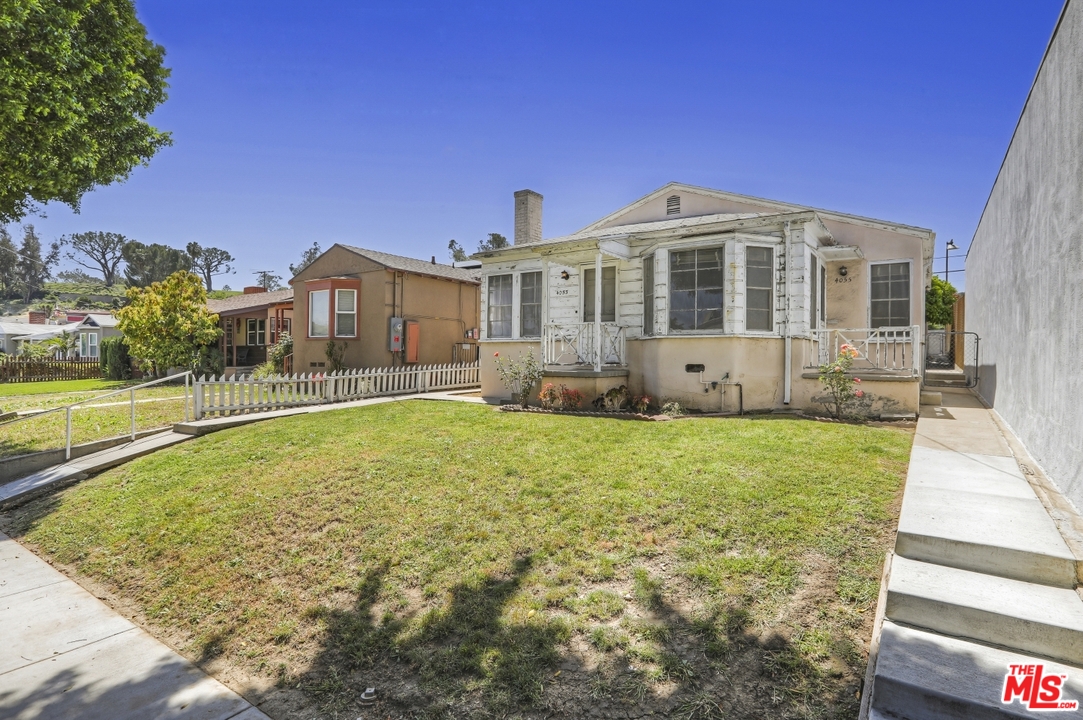 4053 Verdugo Road Los Angeles, CA 90065 - Photo 34 of 45 a view of a house with a yard