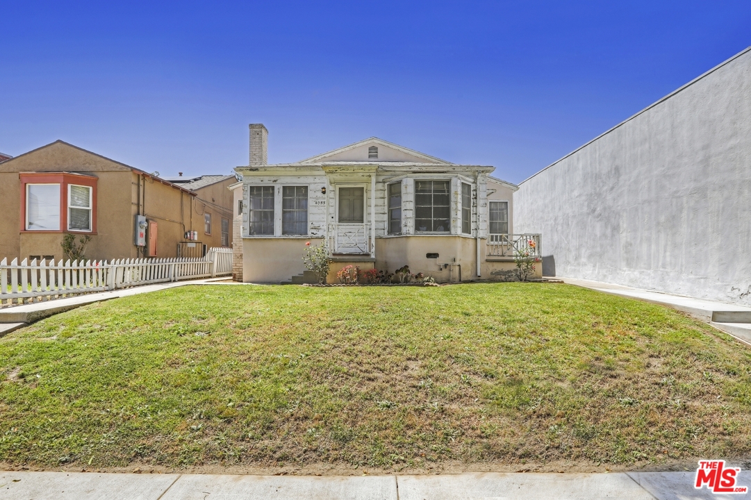 4053 Verdugo Road Los Angeles, CA 90065 - Photo 35 of 45 a front view of a house with a yard