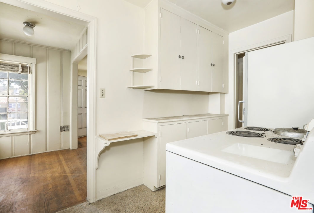 4053 Verdugo Road Los Angeles, CA 90065 - Photo 6 of 45 a utility room with cabinets washer and dryer