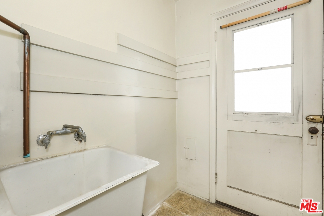 4053 Verdugo Road Los Angeles, CA 90065 - Photo 9 of 45 a bathroom with a tub and a shower