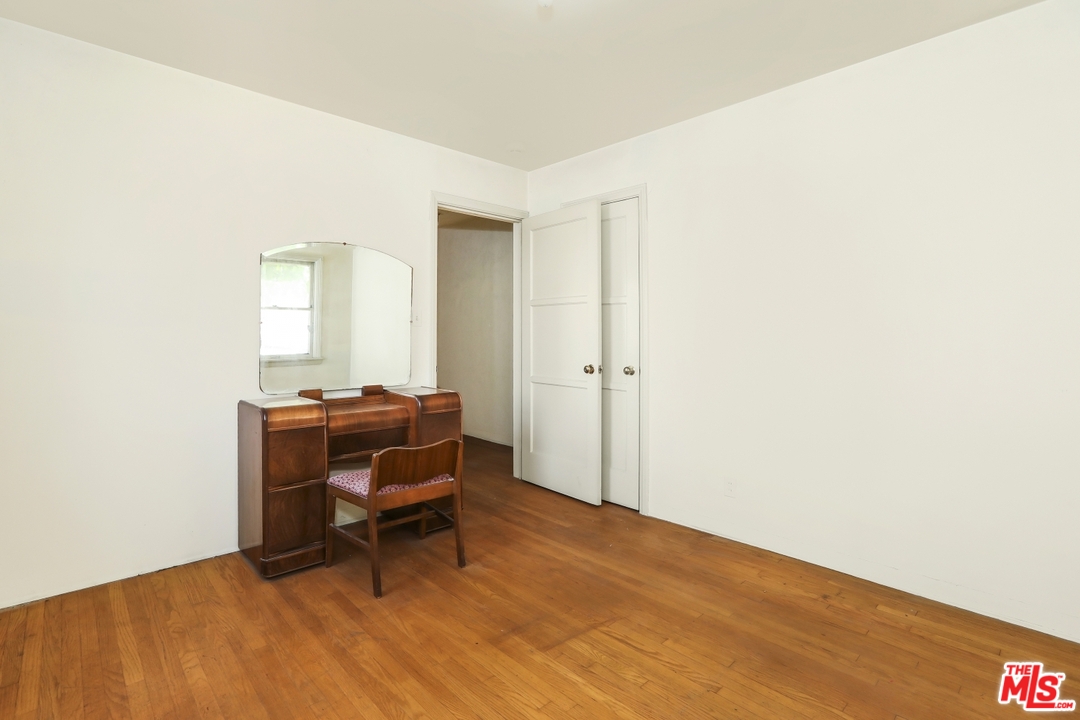 4053 Verdugo Road Los Angeles, CA 90065 - Photo 10 of 45 a room with a bench and a window