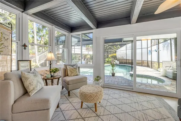 a living room with furniture and a table