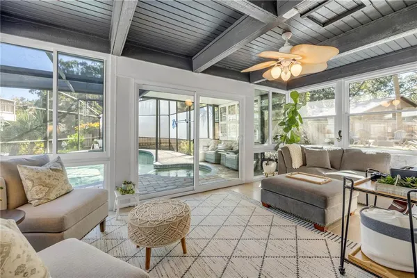 a room with furniture and mirror