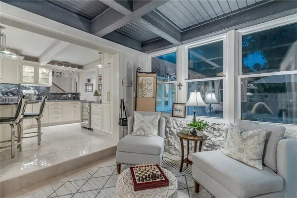 a work room with furniture and windows