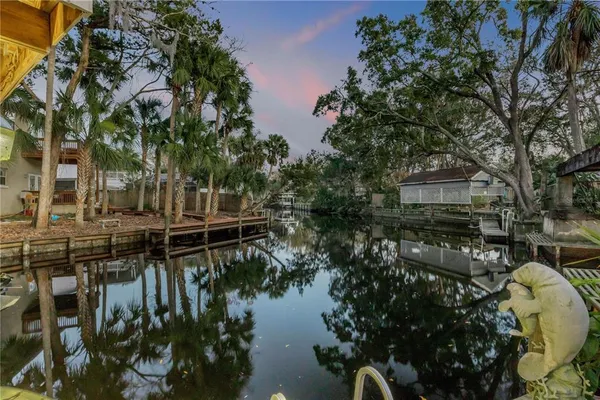 a view of house with outdoor space and seating area