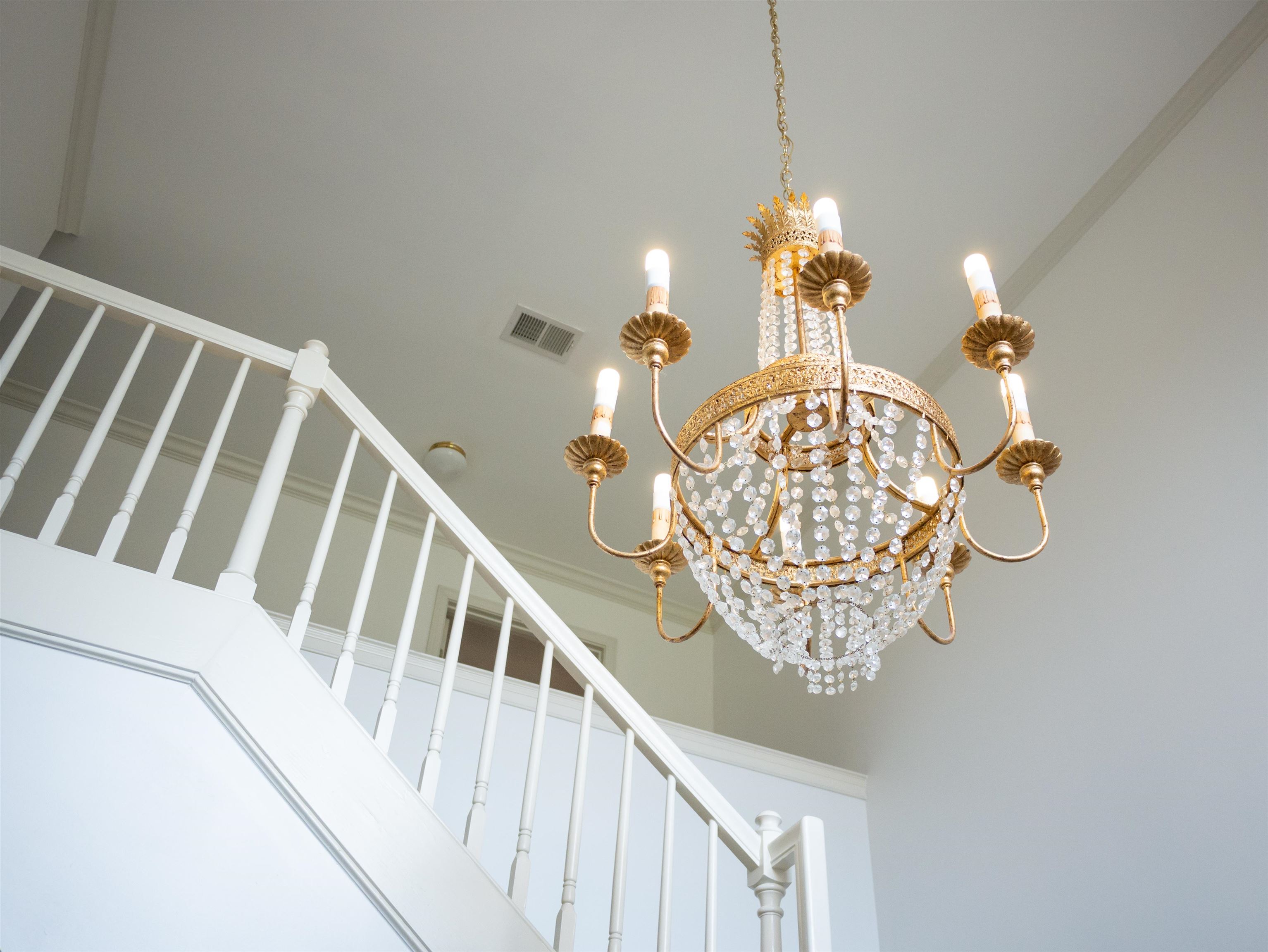 1923 Swynford Lane Collierville, TN 38017 - Photo 20 of 35 Stairway featuring a chandelier