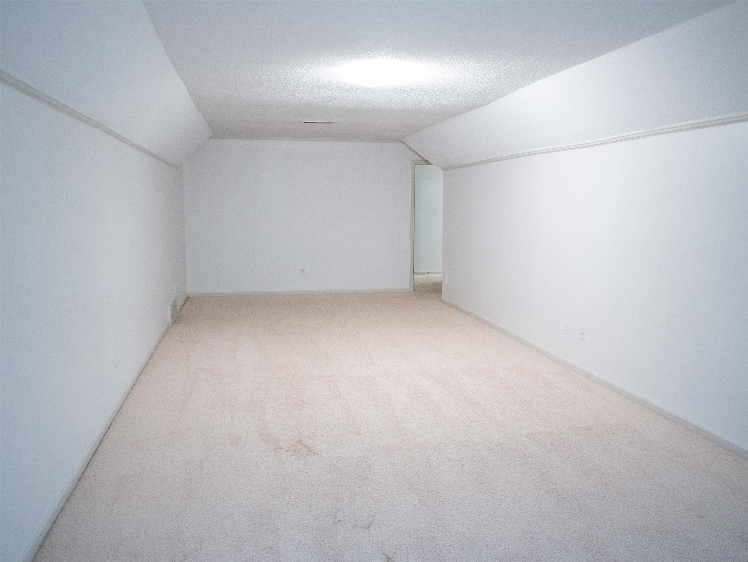 1923 Swynford Lane Collierville, TN 38017 - Photo 23 of 35 an empty room with a empty space and windows