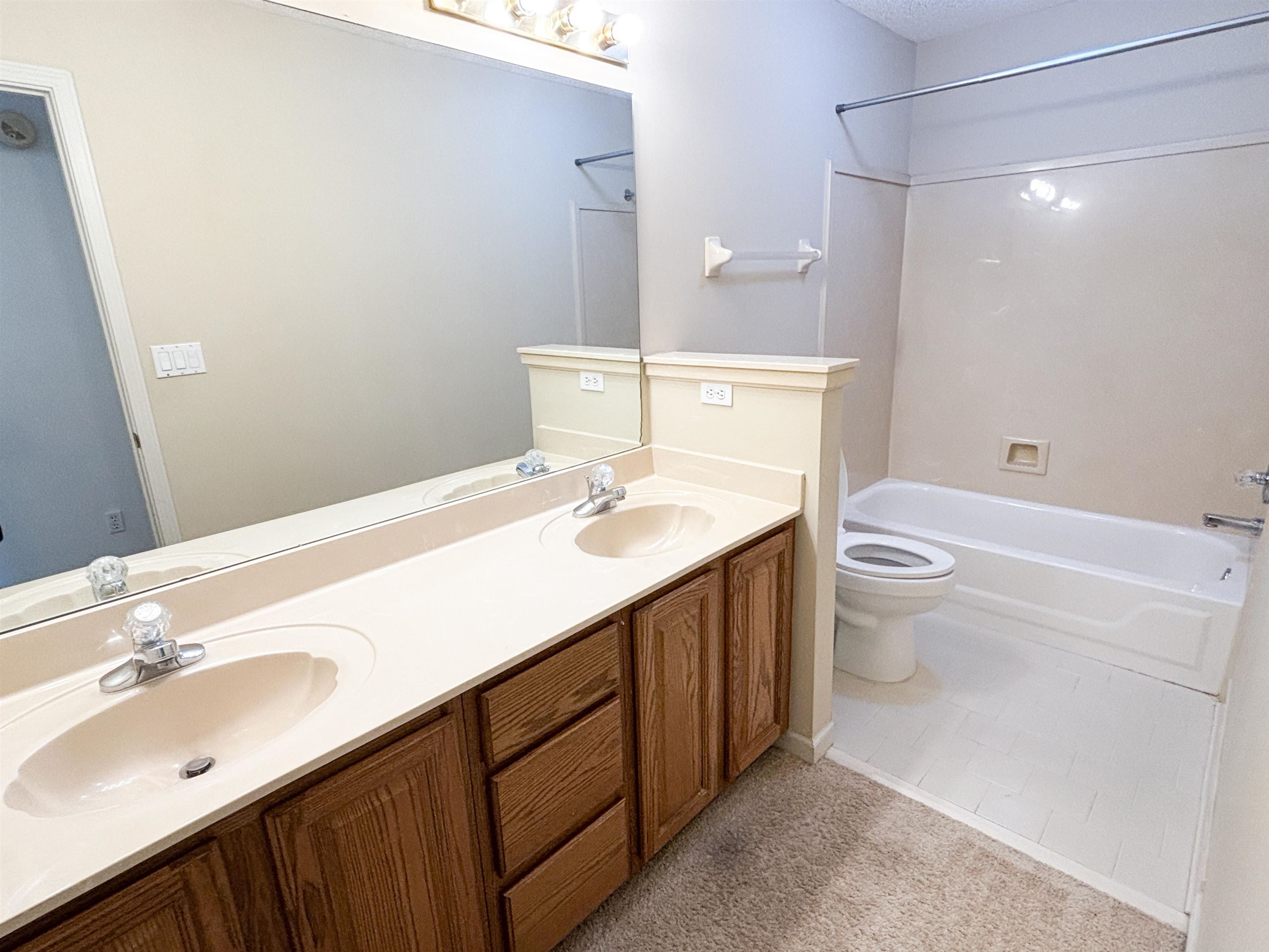 1923 Swynford Lane Collierville, TN 38017 - Photo 26 of 35 Bathroom featuring double vanity and tub / shower combination