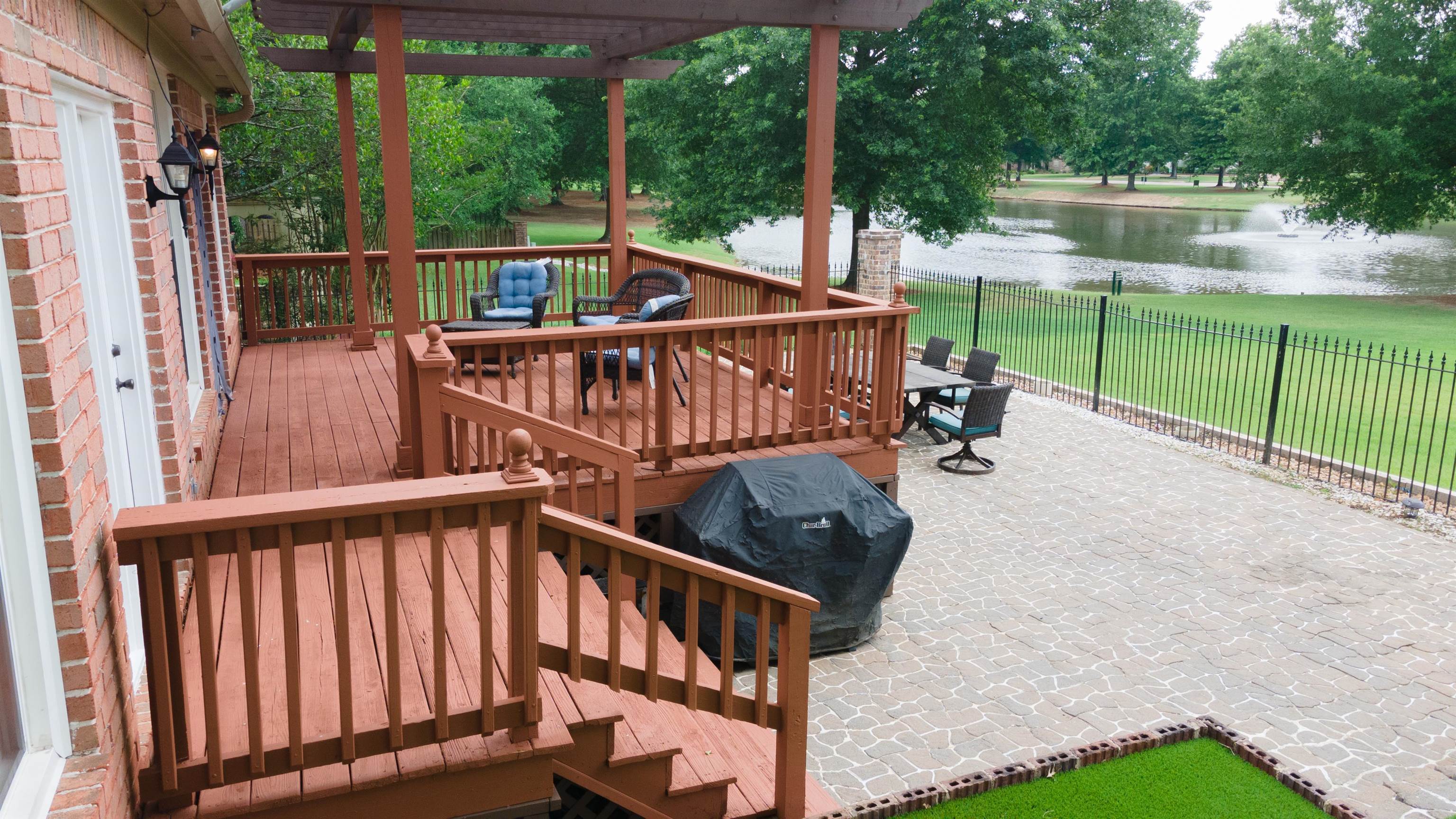 1923 Swynford Lane Collierville, TN 38017 - Photo 31 of 35 Deck with a water view, a grill, outdoor dining area, and a pergola