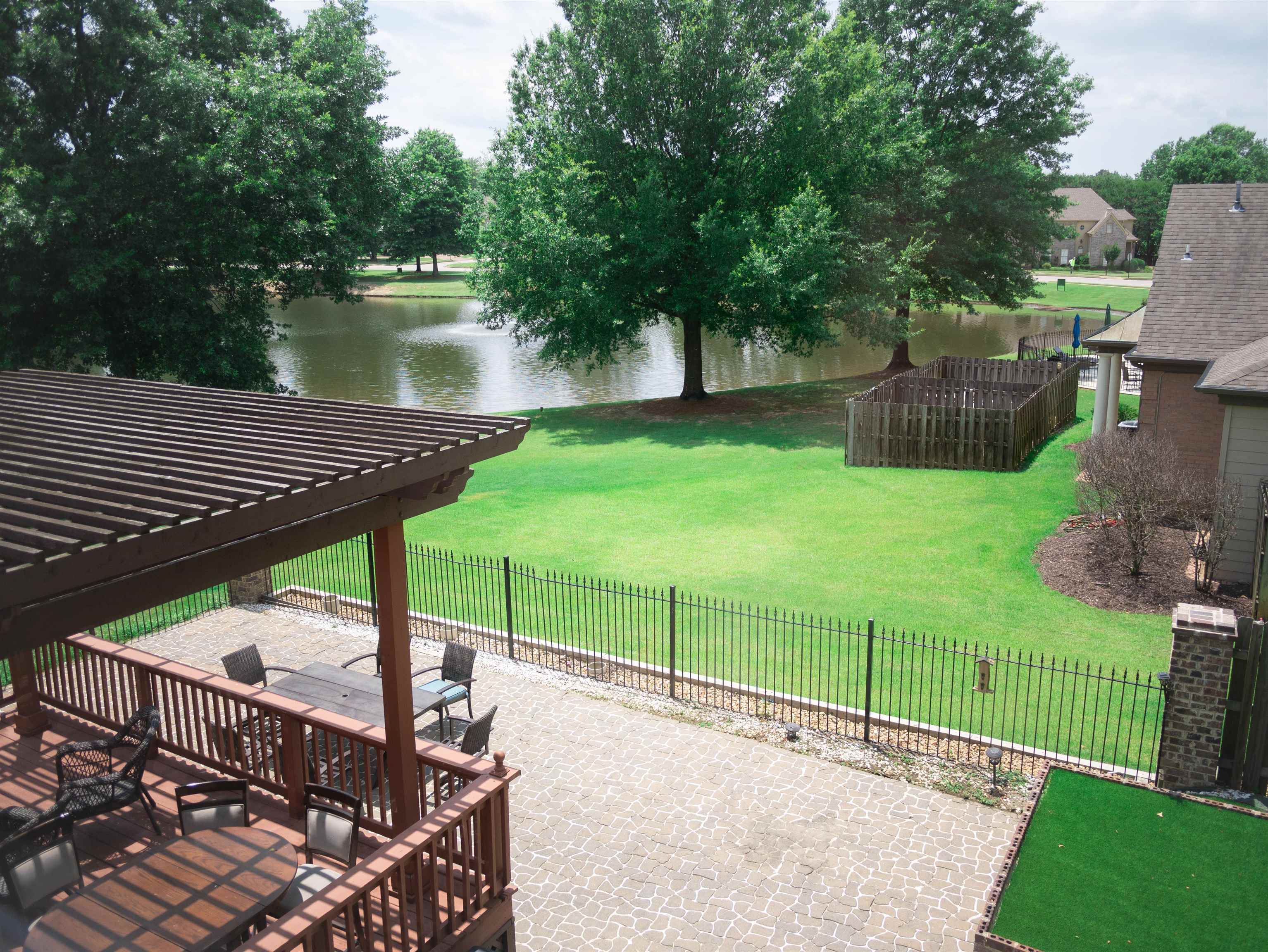 1923 Swynford Lane Collierville, TN 38017 - Photo 34 of 35 a view of a wooden deck with a lake view