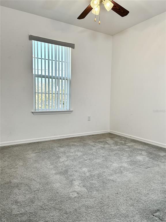4096 Thunderbird Avenue Spring Hill, FL 34606 - Photo 13 of 20 an empty room with a window