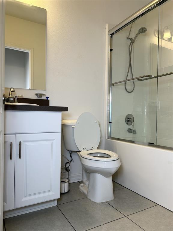 4096 Thunderbird Avenue Spring Hill, FL 34606 - Photo 15 of 20 a bathroom with a toilet sink and shower