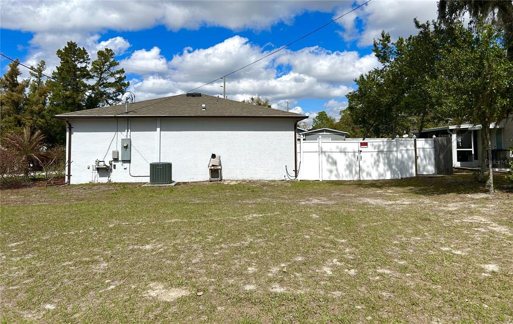 4096 Thunderbird Avenue Spring Hill, FL 34606 - Photo 5 of 20 a view of a house with a yard