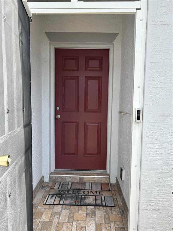 4096 Thunderbird Avenue Spring Hill, FL 34606 - Photo 6 of 20 a view of a wooden door