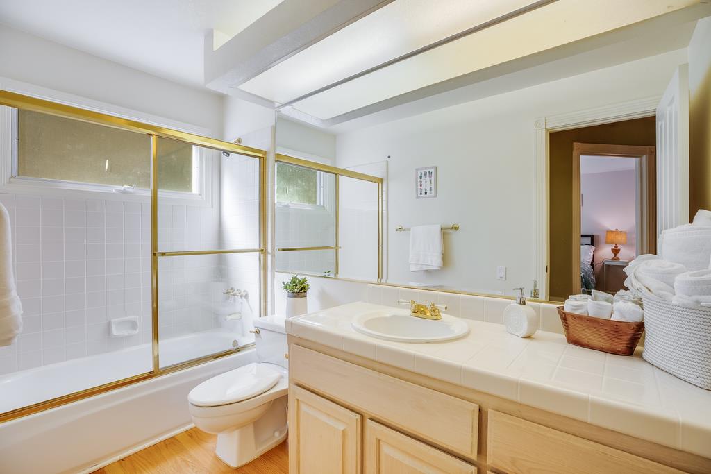20 Trace Lane Half Moon Bay, CA 94019 - Photo 13 of 33 a bathroom with a sink and a mirror