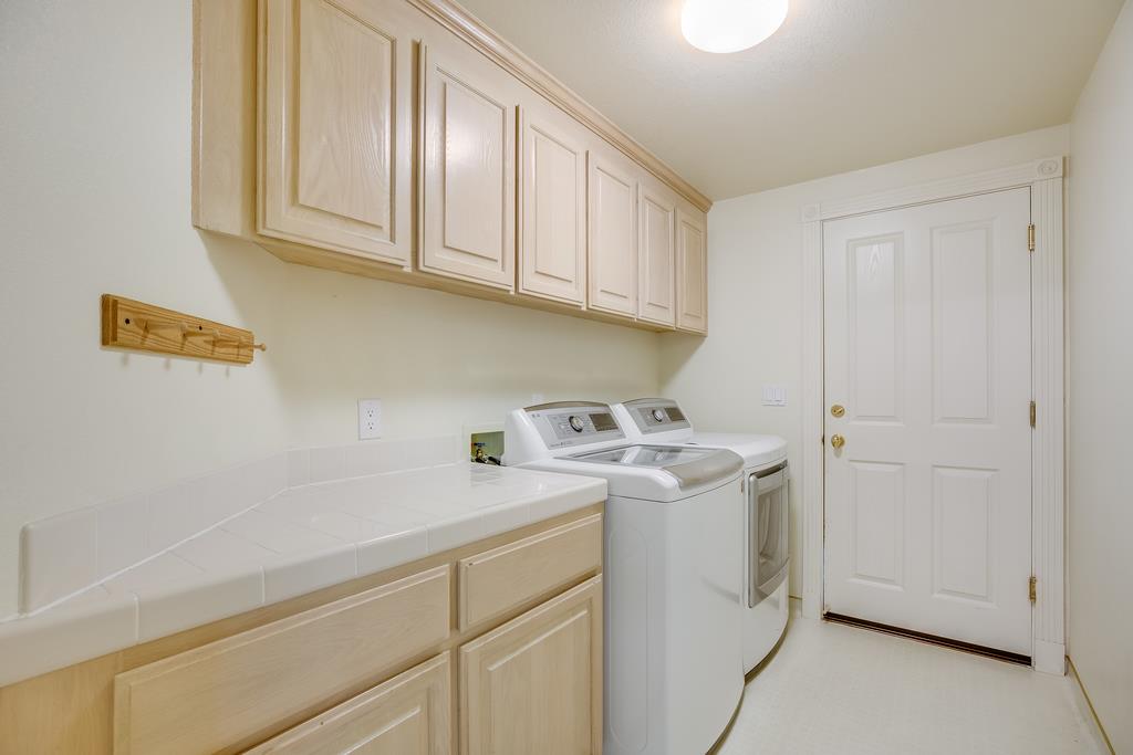 20 Trace Lane Half Moon Bay, CA 94019 - Photo 14 of 33 a utility room with dryer and washer