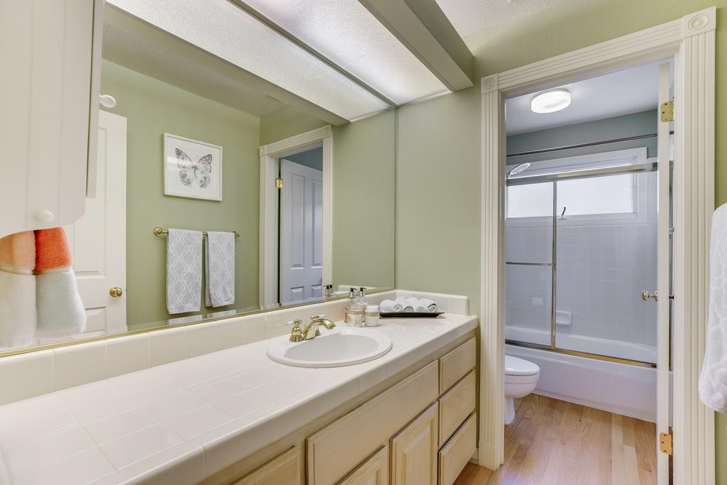 20 Trace Lane Half Moon Bay, CA 94019 - Photo 17 of 33 a bathroom with a sink and a mirror