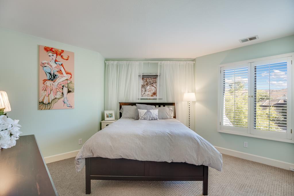 20 Trace Lane Half Moon Bay, CA 94019 - Photo 19 of 33 a bedroom with a bed and a window