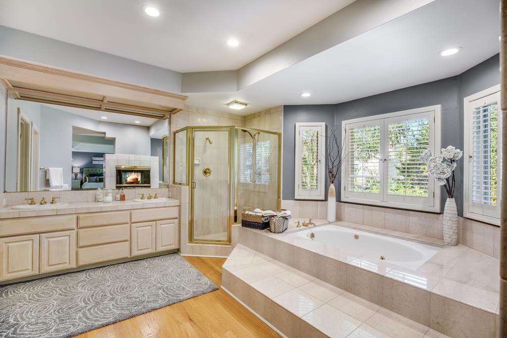 20 Trace Lane Half Moon Bay, CA 94019 - Photo 23 of 33 a large spacious bathroom with a large tub shower and sink