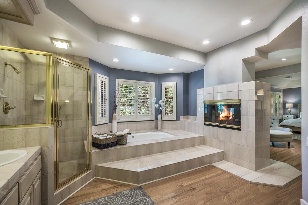 20 Trace Lane Half Moon Bay, CA 94019 - Photo 24 of 33 a spacious bathroom with a tub a sink and mirror