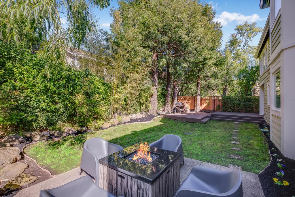 20 Trace Lane Half Moon Bay, CA 94019 - Photo 26 of 33 a view of a couches in the backyard with large trees