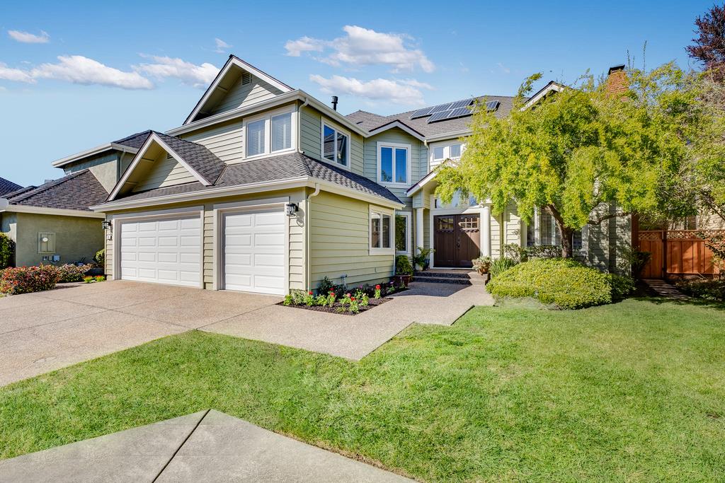 20 Trace Lane Half Moon Bay, CA 94019 - Photo 29 of 33 a front view of a house with a yard and garage