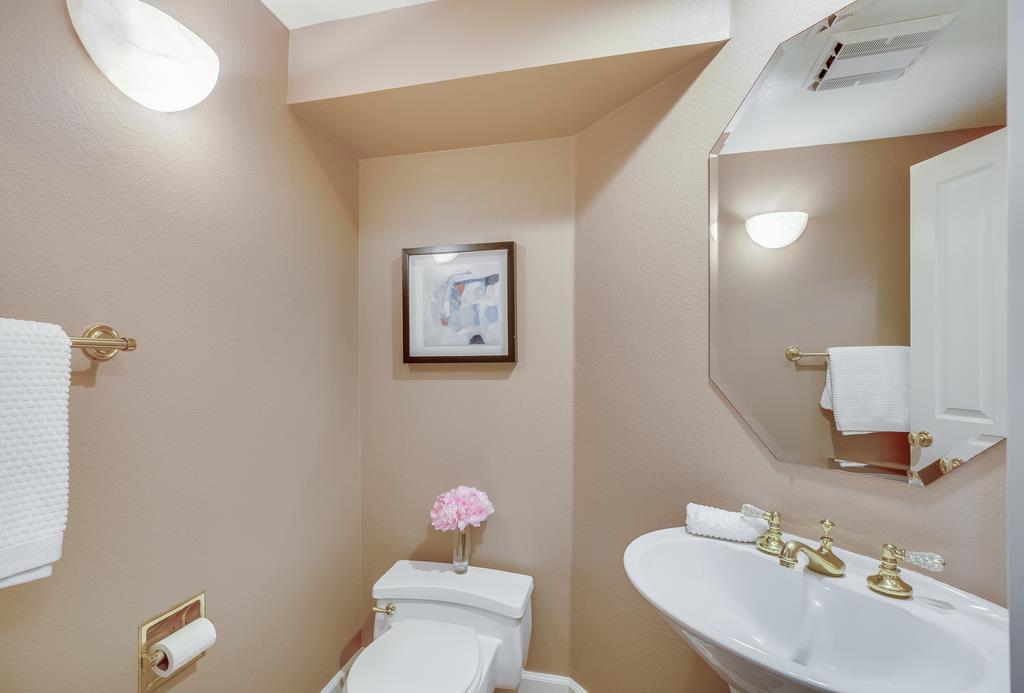 20 Trace Lane Half Moon Bay, CA 94019 - Photo 6 of 33 a bathroom with a sink mirror and vanity