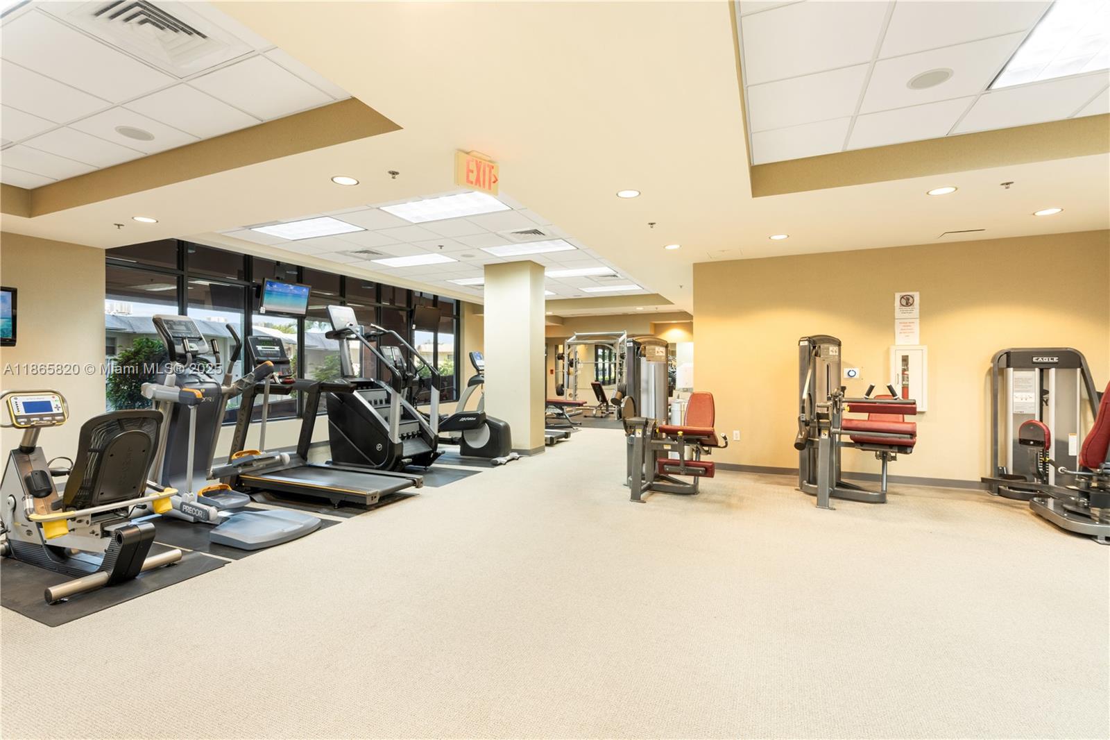 8395 Southwest 73rd Avenue, Unit 517 Miami, FL 33143 - Photo 11 of 27 a view of a room with gym equipment