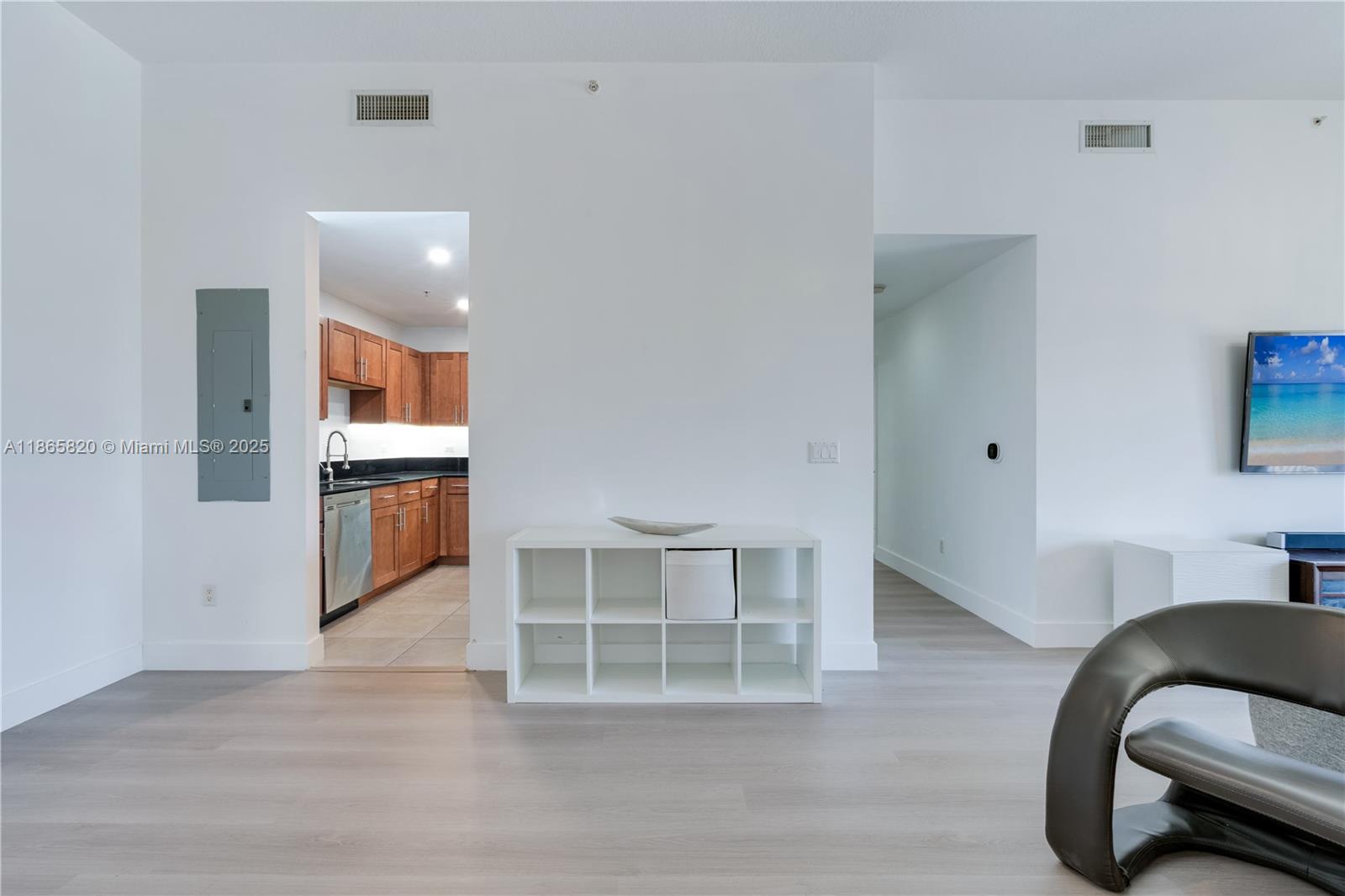8395 Southwest 73rd Avenue, Unit 517 Miami, FL 33143 - Photo 16 of 27 a view of livingroom with furniture and cabinet