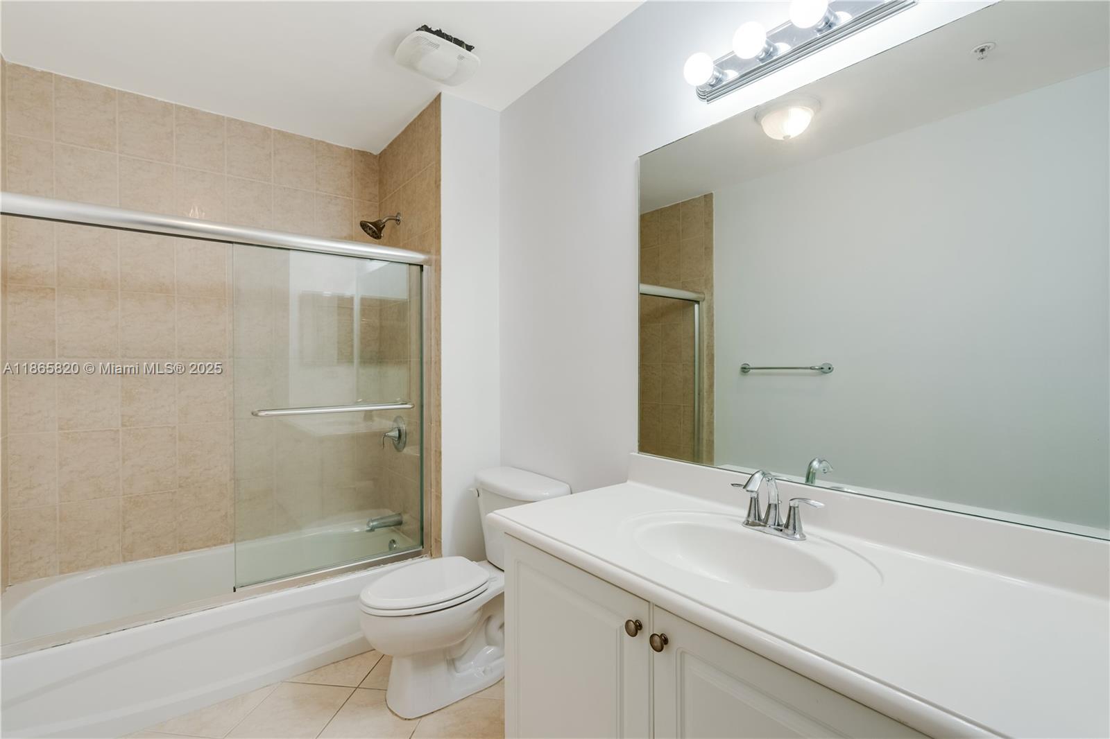 8395 Southwest 73rd Avenue, Unit 517 Miami, FL 33143 - Photo 17 of 27 a bathroom with a sink toilet and shower
