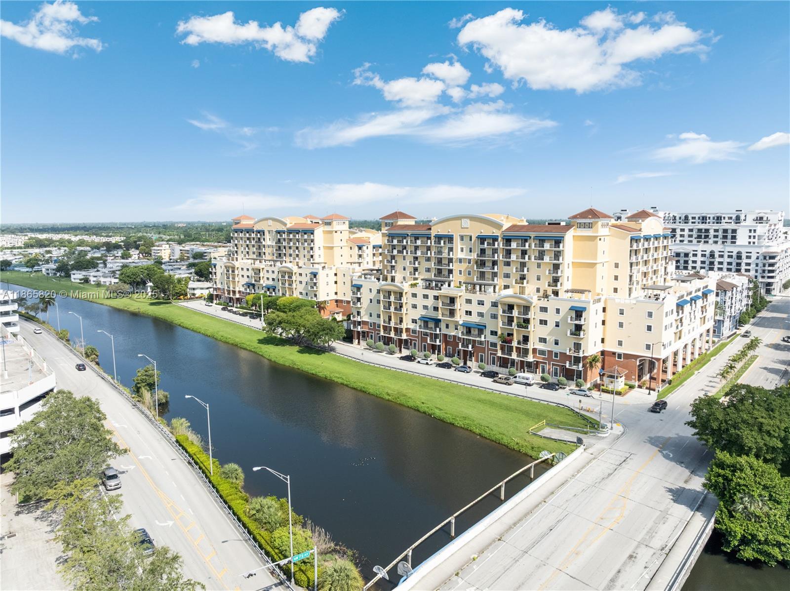 8395 Southwest 73rd Avenue, Unit 517 Miami, FL 33143 - Photo 23 of 27 a view of a city skyline from a balcony