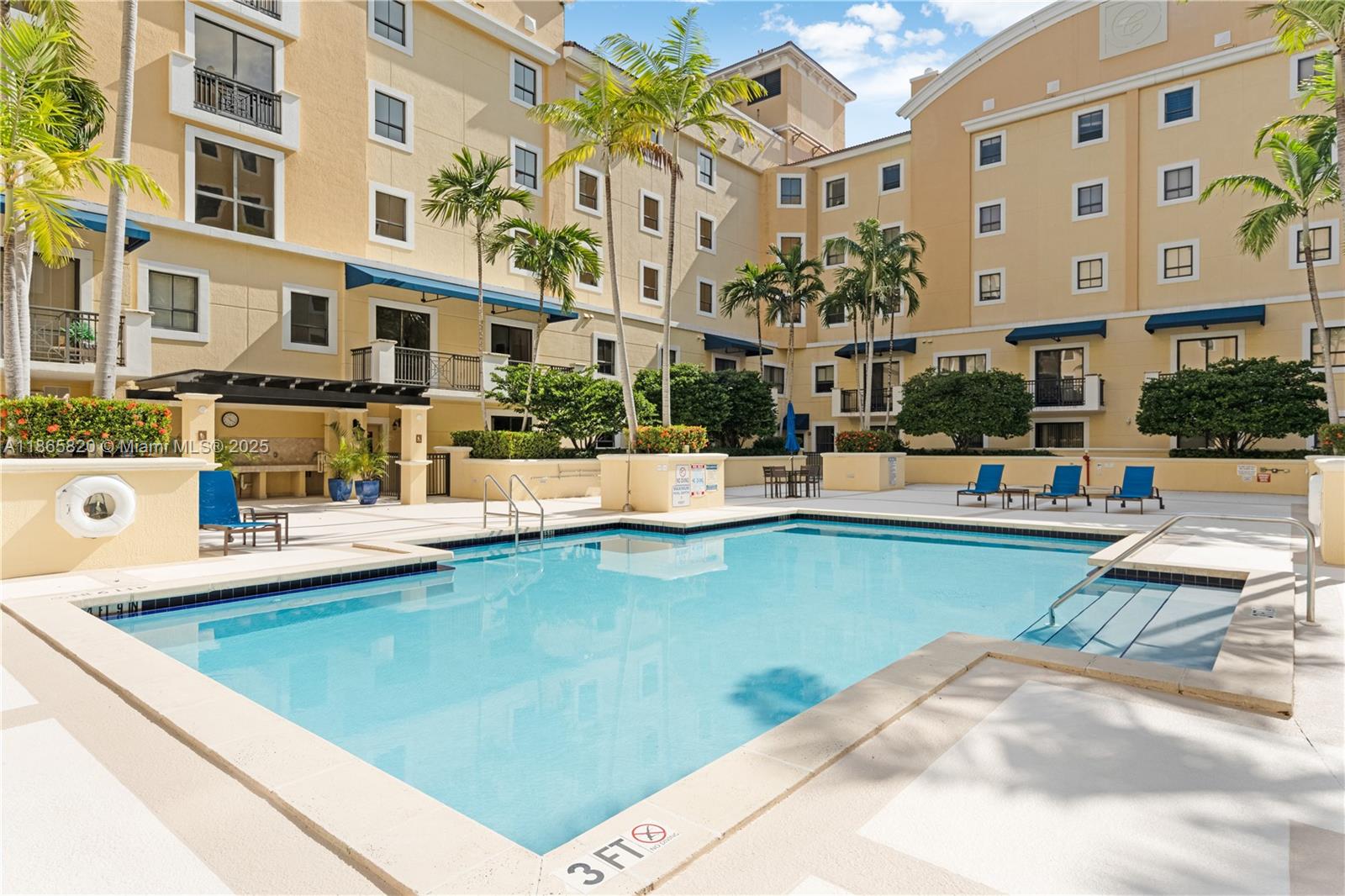 8395 Southwest 73rd Avenue, Unit 517 Miami, FL 33143 - Photo 9 of 27 a view of a swimming pool with a patio