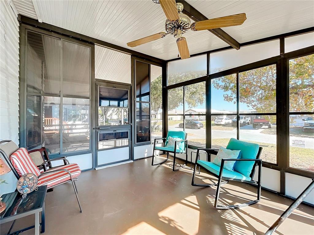 6 Cayman Circle Umatilla, FL 32784 - Photo 25 of 34 a living room with furniture and a large window