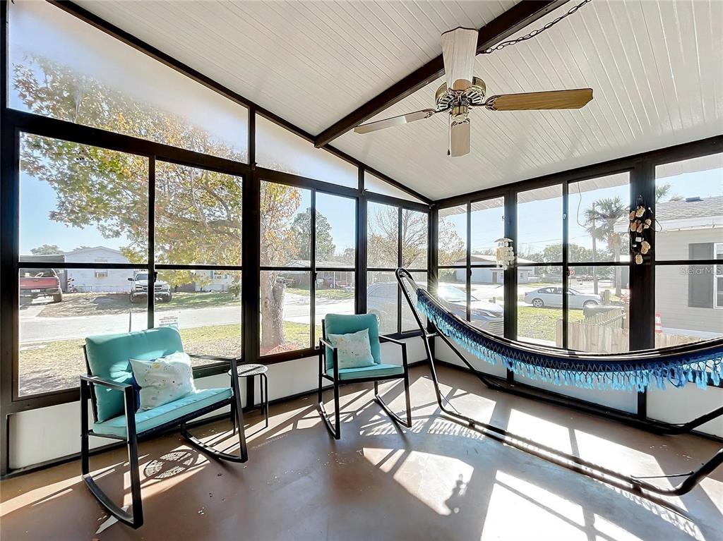 6 Cayman Circle Umatilla, FL 32784 - Photo 27 of 34 a living room with furniture and a window