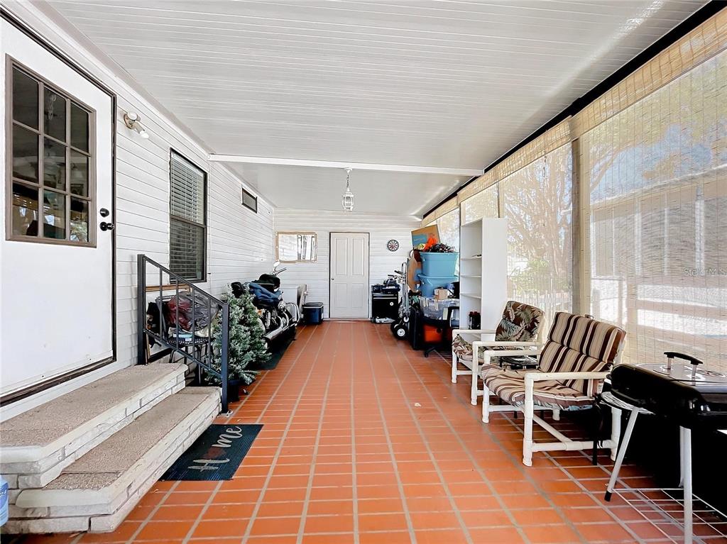 6 Cayman Circle Umatilla, FL 32784 - Photo 4 of 34 a lobby with furniture and floor to ceiling window