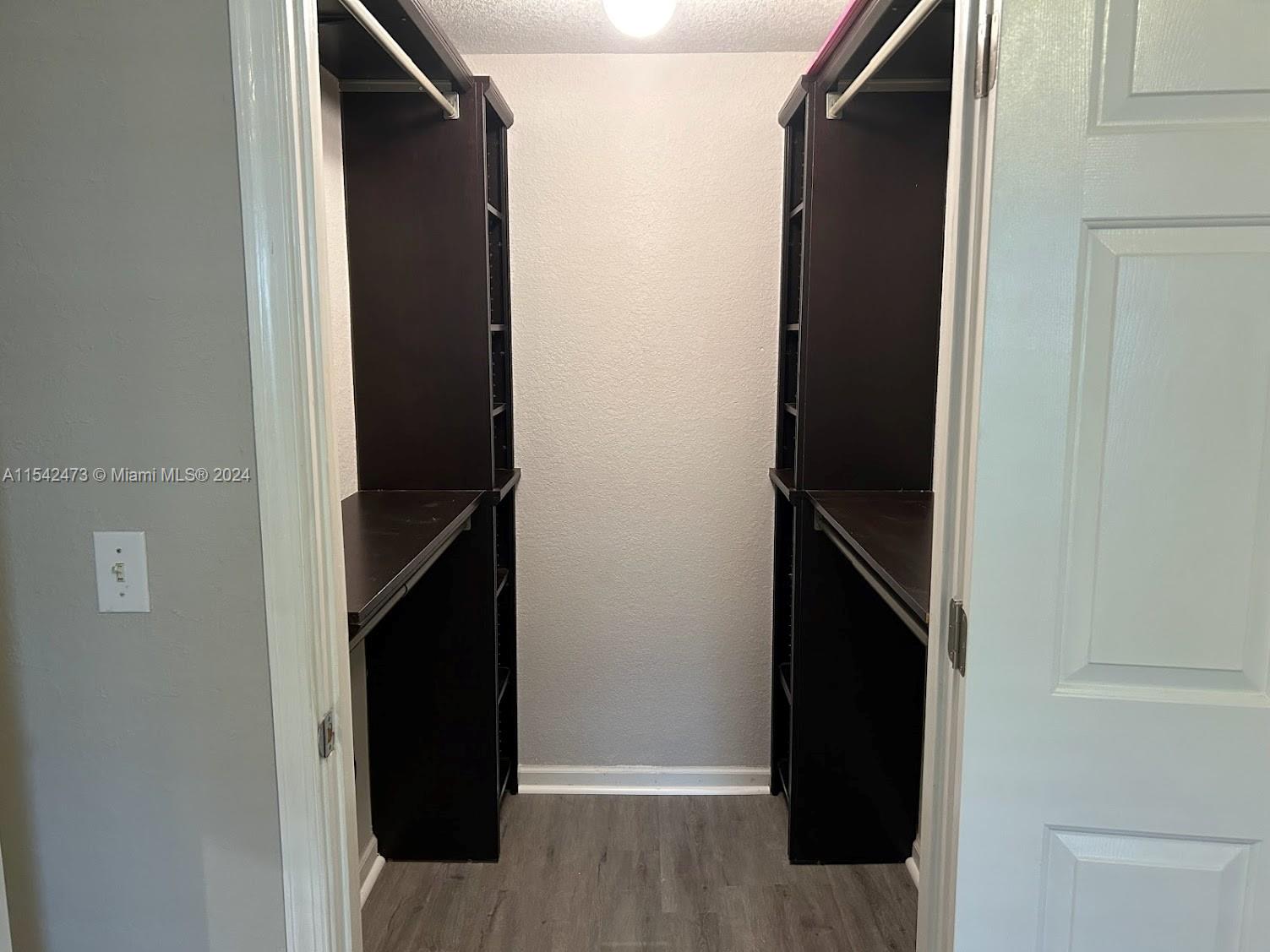 4802 Washington Street, Unit 5 Hollywood, FL 33021 - Photo 11 of 20 view of closet with wooden door
