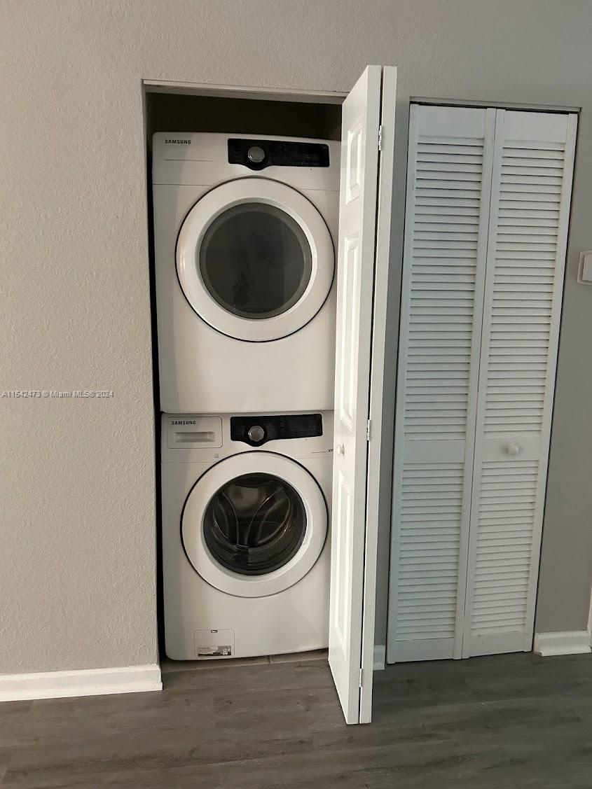 4802 Washington Street, Unit 5 Hollywood, FL 33021 - Photo 13 of 20 a view of a hallway with washer and dryer