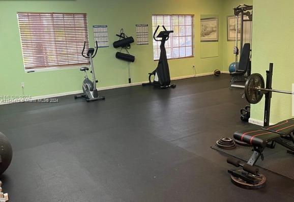 4802 Washington Street, Unit 5 Hollywood, FL 33021 - Photo 19 of 20 a view of a room with gym equipment