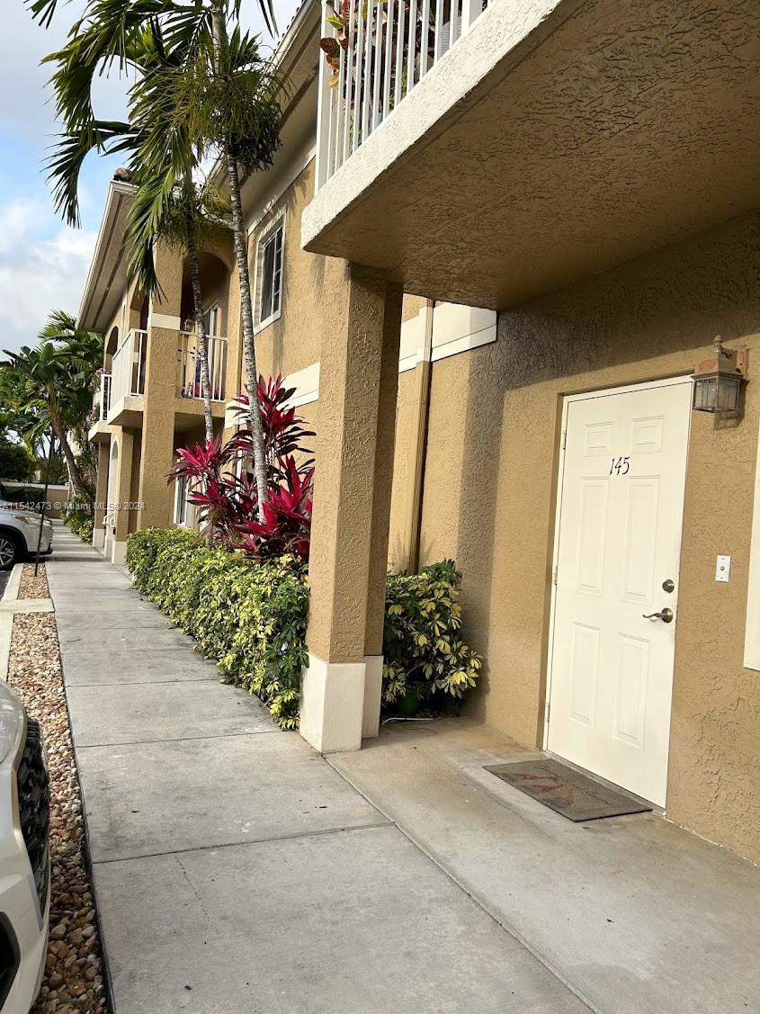 4802 Washington Street, Unit 5 Hollywood, FL 33021 - Photo 20 of 20 a front view of a house