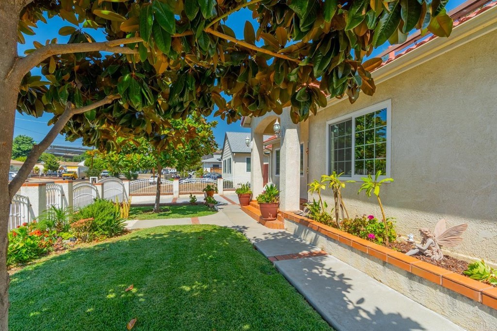 3335 Fairway Drive La Mesa, CA 91941 - Photo 3 of 30 a front view of a house with a yard table and chairs