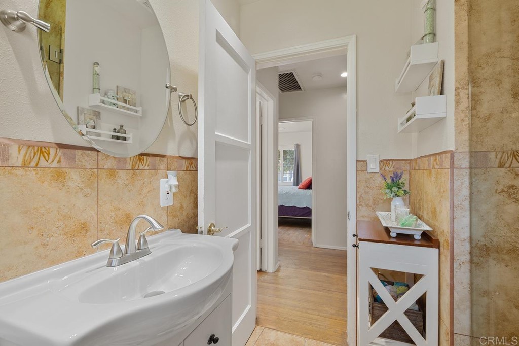 3335 Fairway Drive La Mesa, CA 91941 - Photo 21 of 30 a bathroom with a sink and a mirror