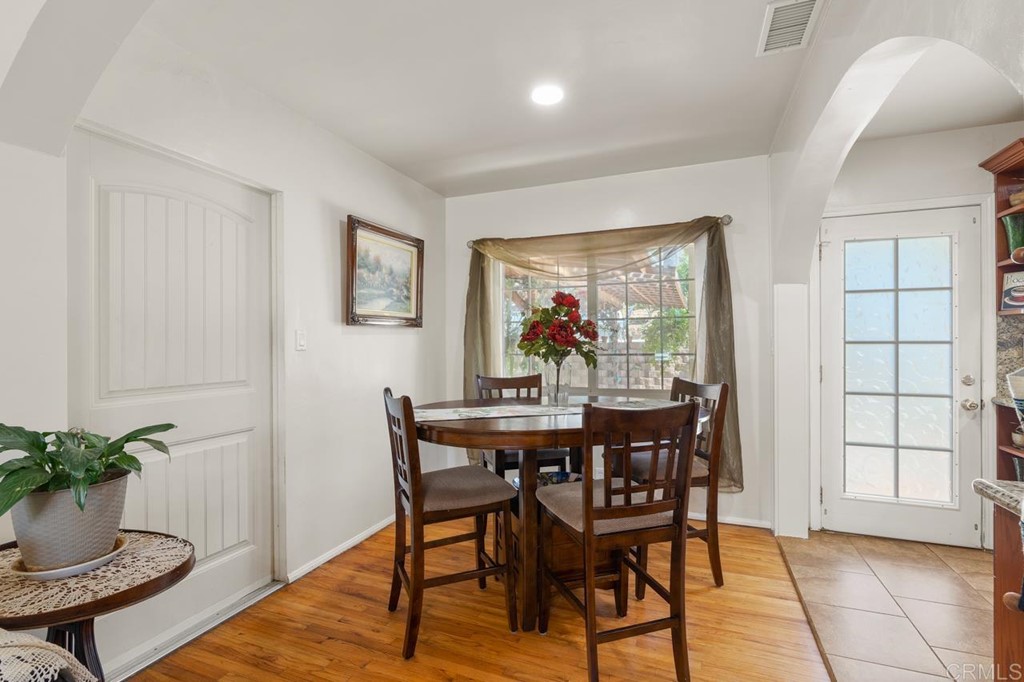3335 Fairway Drive La Mesa, CA 91941 - Photo 8 of 30 a view of a dining room with furniture and wooden floor