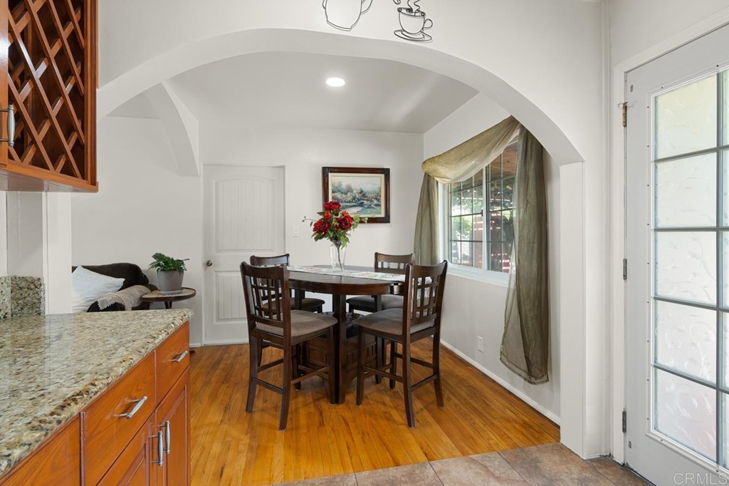 3335 Fairway Drive La Mesa, CA 91941 - Photo 10 of 30 a view of a dining room with furniture and wooden floor