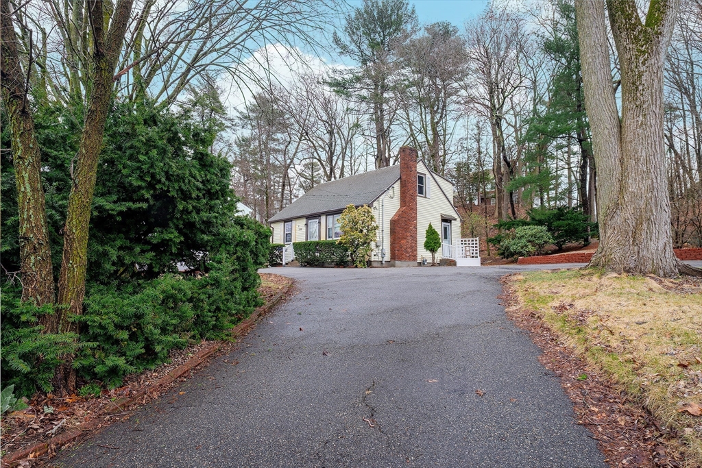 2096 Washington Street Newton, MA 02468 - Photo 2 of 13 a view of a house with a yard and basketball court