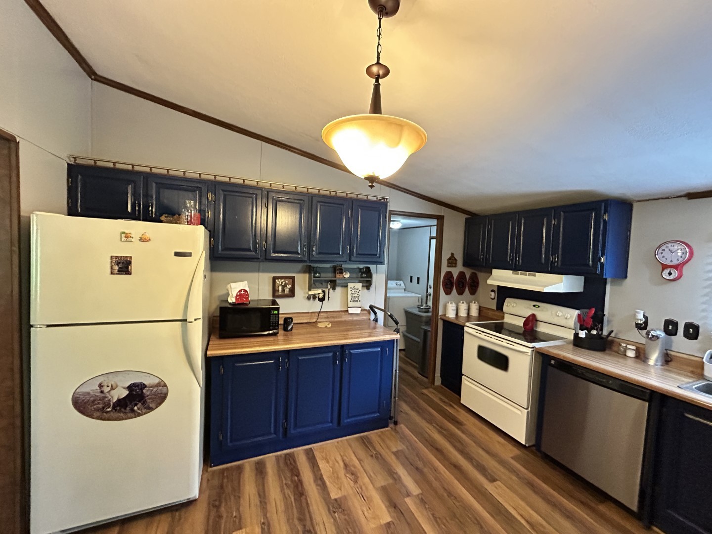 1575 Taylor Road Manchester, TN 37355 - Photo 7 of 28 a kitchen with granite countertop a sink a stove a refrigerator and a stove