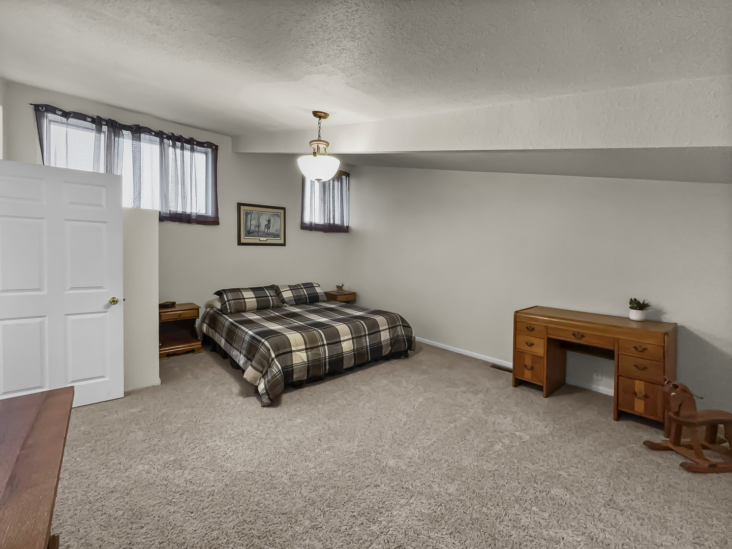 2604 East 1100 North Road Milford, IL 60953 - Photo 20 of 44 a bedroom with a bed and a table in it