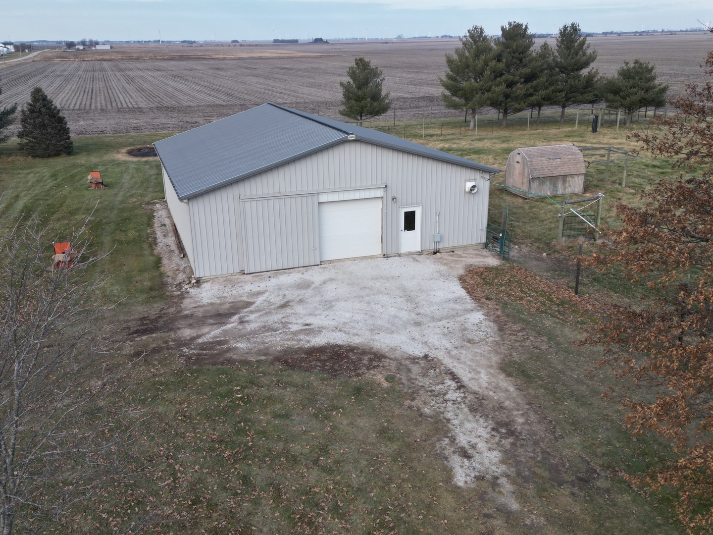 2604 East 1100 North Road Milford, IL 60953 - Photo 5 of 44 a view of a house with a yard and garage