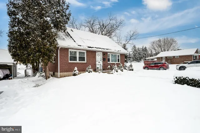 a street view covered with snow