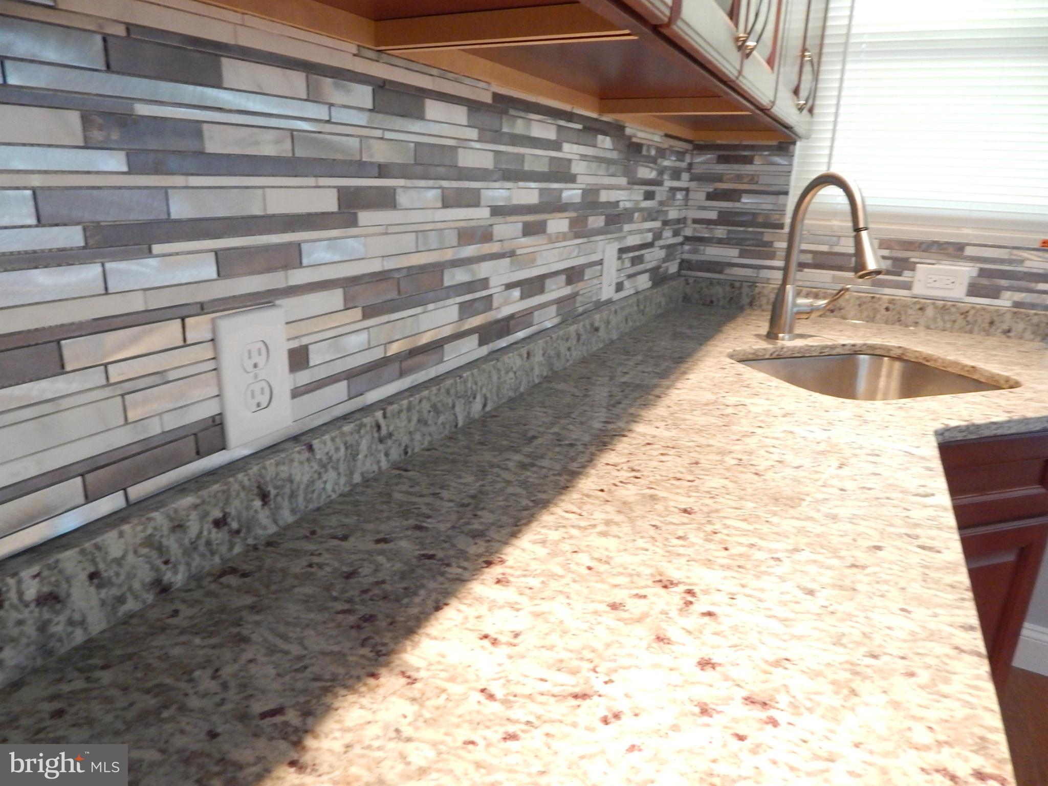 5618 Clearspring Road Baltimore, MD 21212 - Photo 14 of 30 a close view of sink and washing machine